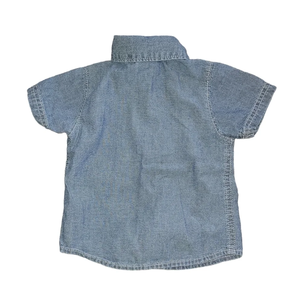 Carter’s size 6 months denim short sleeve shirt